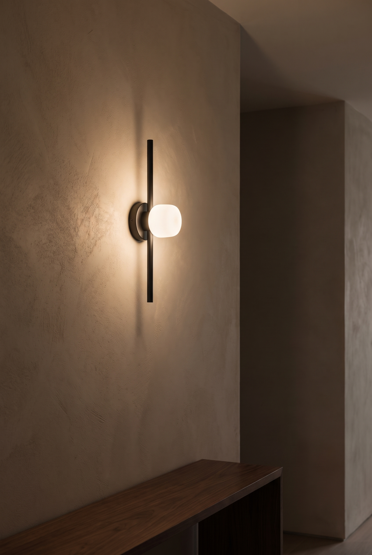 BRAND-05-SCONCE — wall sconce in a warm plaster hallway