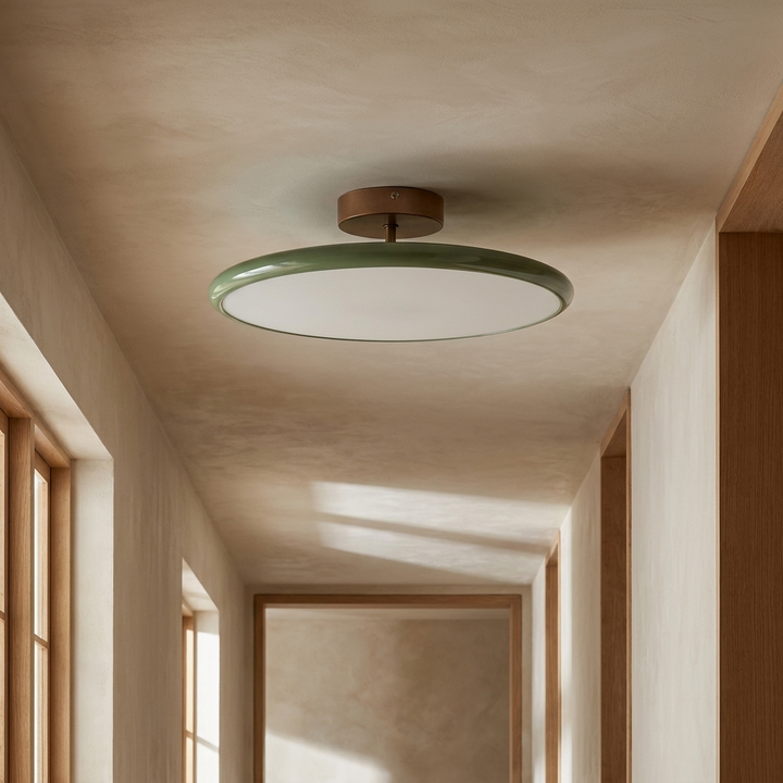 NYRVELA Drift Adjustable Ceiling Lamp installed in an architectural hallway ceiling, upward angle