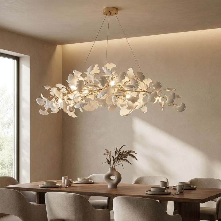 NYRVEQO Gingko Plume Chandelier with organic gingko-leaf-form cluster, hanging above a dining table