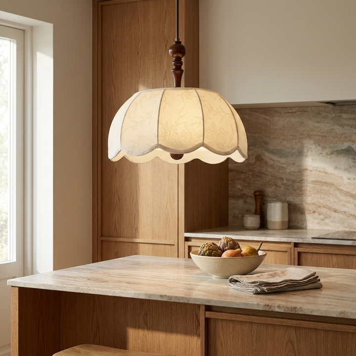 NYRVELA Elowen Blossom Lantern Pendant Lamp hanging above a kitchen island with natural stone countertop