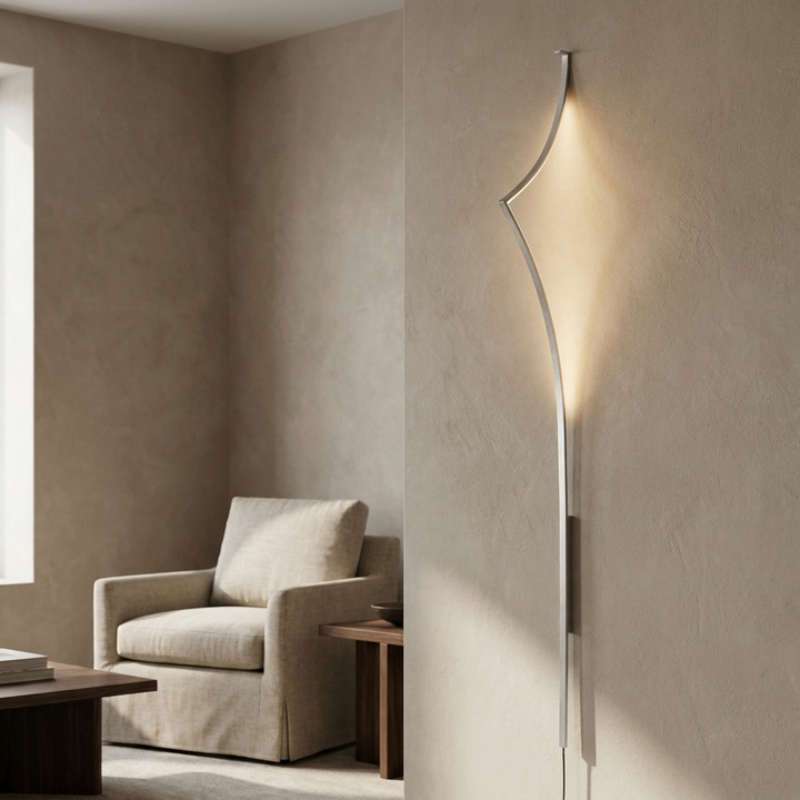 Minimalist Curving Ribbon LED Wall Sconce shown in a living room corner