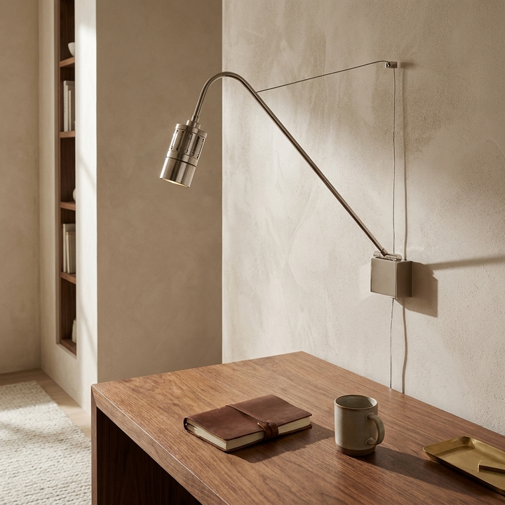 Minimalist Adjustable Task Wall Sconce shown above a home office desk