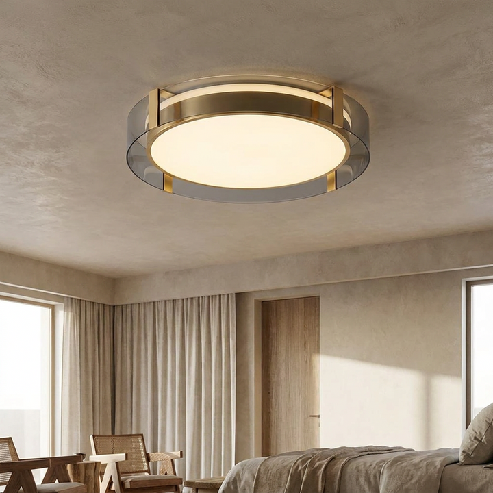 Round Low Profile Ceiling Light installed on a bedroom ceiling with warm architectural lighting